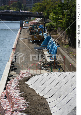 River reinforcement work River reinforcement work 135769447