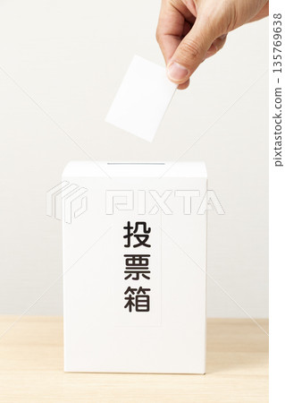 Hands of a man voting 135769638