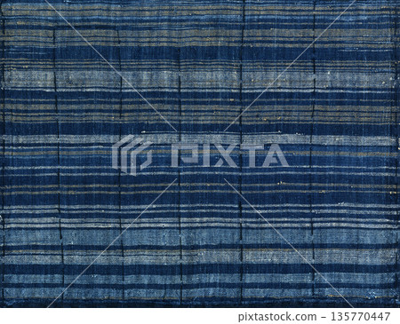 Stripes made from leftover threads, an ancient indigo-dyed fabric Stripes made from leftover threads, an ancient indigo-dyed fabric 135770447