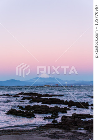 The shadow of the Earth at dawn and Mount Fuji dyed pink by the Venus Belt seen from Mase Coast in Hayama Town in winter The shadow of the Earth at dawn and Mount Fuji dyed pink by the Venus Belt seen from Mase Coast in Hayama Town in winter 135770967