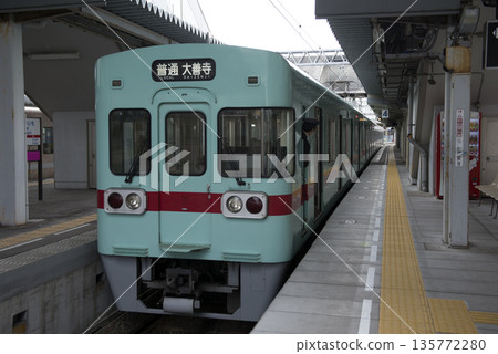 Conductor checking safety before train departure Conductor checking safety before train departure 135772280
