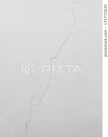 Vertical background image 2 of a white-gray concrete wall with vertical and diagonal cracks Vertical background image 2 of a white-gray concrete wall with vertical and diagonal cracks 135772630