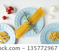 Blue plate and three types of pasta 135772967