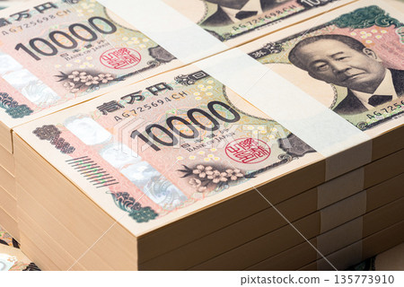Background of stacks of 10,000 yen bills 135773910