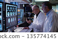 Doctor man with brain research on monitor computer in laboratory. 135774145