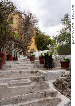 Narrow streets of Anafiotika area in ancient Athens 135774203