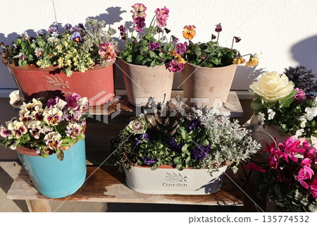 Flower arrangements placed on a flower stand Flower arrangements placed on a flower stand 135774532