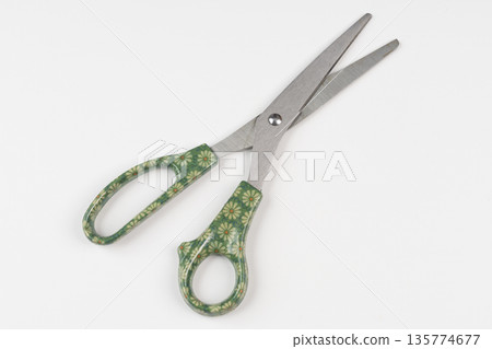 a pair of scissors with decorated handles a pair of scissors with decorated handles 135774677