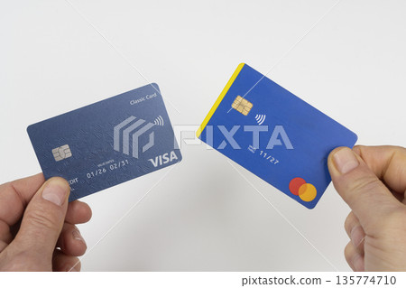 Comparison of a VISA credit card and a MasterCard 135774710