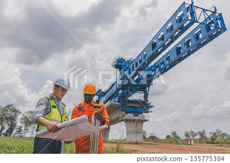 Engineer survey team checking construction project  inspection work construction site 135775384