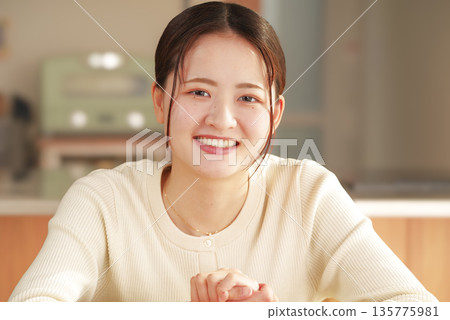 Smiling and positive female portrait Smiling and positive female portrait 135775981