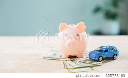 Car money piggy bank save auto insurance fuel refinance loan finance drive gas transportation cost with banknotes helps manage budget for vehicle maintenance and automobile expense Car money piggy bank save auto insurance fuel refinance loan finance drive gas transportation cost with banknotes helps manage budget for vehicle maintenance and automobile expense 135777463