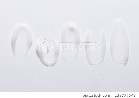A sample of a white moisturizing cosmetic cream for the body or face with hyaluronic acid A sample of a white moisturizing cosmetic cream for the body or face with hyaluronic acid 135777545