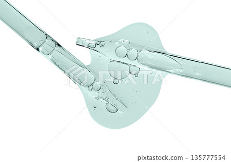 A sample of facial serum or gel or moisturizer with a pipette. Isolated on white. A sample of facial serum or gel or moisturizer with a pipette. Isolated on white. 135777554