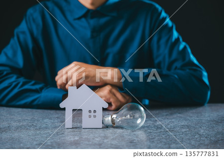 house lightbulb light bulb energy estate home real innovation idea symbolizes mortgage creative property savings, man provides electricity knowledge for sustainable living ideas 135777831