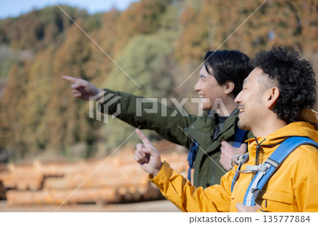 Image of tourists climbing mountains Image of tourists climbing mountains 135777884