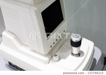Autorefractor control panel with joystick for precise movement of device toward patient head. Technologies in ophthalmology. Autorefractor for simultaneous measurement of corneal and pupil diameters 135780215