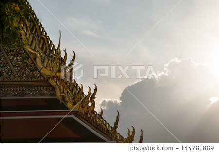 The roof of the Thai temple, along with the gable at the top of the temple roof that receives on beautiful sun. 135781889