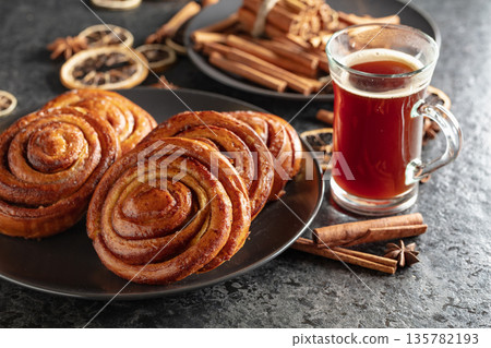 Kanelbullar - Swedish cinnamon buns or rolls. Kanelbullar - Swedish cinnamon buns or rolls. 135782193