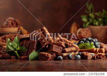 Brownie with blueberries and mint. Brownie with blueberries and mint. 135782209