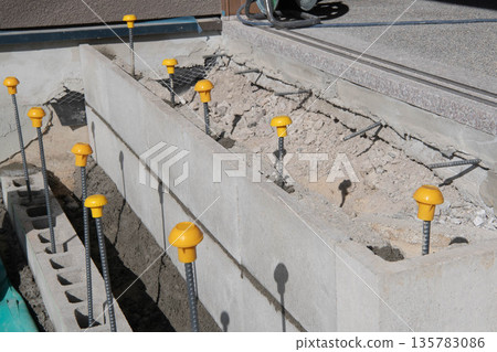 Safety cap on top of rebar 135783086