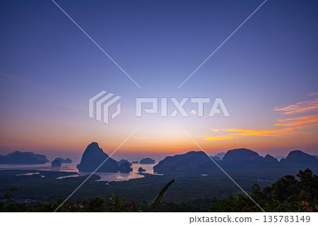 aerial view stunning red sunrise over Samed Nang Chee Phang Nga archipelago. 135783149