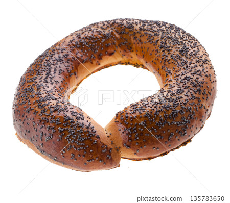 Ruddy bagel with top sprinkled with poppy seeds, on a white background in isolation Ruddy bagel with top sprinkled with poppy seeds, on a white background in isolation 135783650