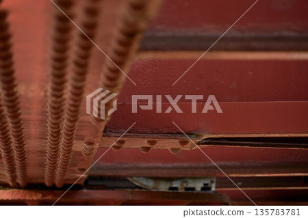 Texture of countless rivets used on the piers of an old iron bridge Texture of countless rivets used on the piers of an old iron bridge 135783781