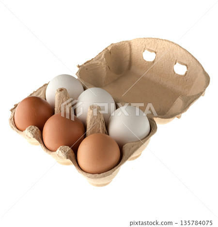 Chicken eggs in a paper disposable tray, in the amount of six pieces on a white background in isolation Chicken eggs in a paper disposable tray, in the amount of six pieces on a white background in isolation 135784075