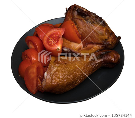 Chicken meat and tomatoes on a black plate, on a white background in isolation Chicken meat and tomatoes on a black plate, on a white background in isolation 135784144