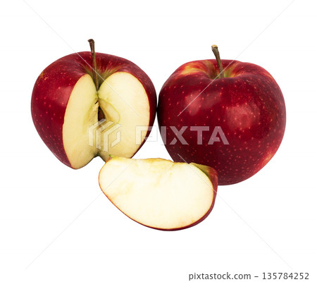 Ripe apple of red filling and a cut part from it and a whole apple on a white background in isolation Ripe apple of red filling and a cut part from it and a whole apple on a white background in isolation 135784252