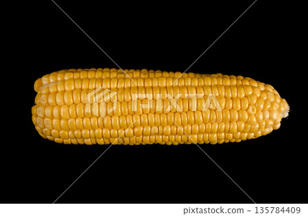 young corn swing, on a black background in isolation, close-up 135784409