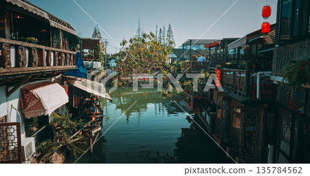 Lively riverside dining with floating greenery and traditional architecture. Zhujiajiao, Shanghai, China Lively riverside dining with floating greenery and traditional architecture. Zhujiajiao, Shanghai, China 135784562