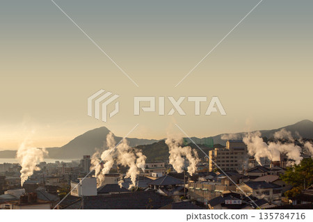 Beppu city morning glow and snowmobile 135784716