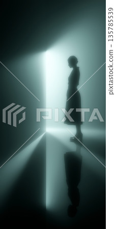Silhouette of woman in light ray leaving darkness. Female silhouette standing in a beam of light, symbolizing hope and new beginnings 135785539