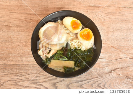 Tonkotsu Chashu ramen orJapanese yellow noodles topping slice braised pork with boiled egg and seaweed in Miso soy sauce on bowl 135785938