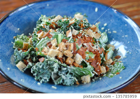 caesar salad or vegetable salad with bacon 135785959
