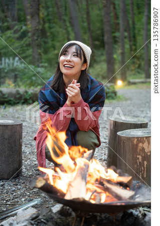 A woman enjoying the outdoors 135786907
