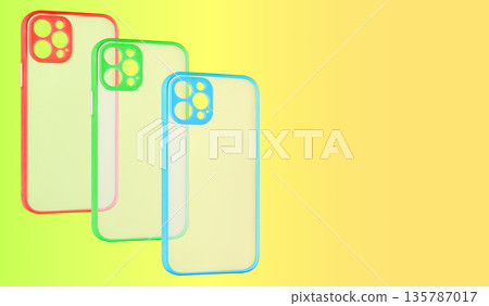 silicone phone case partially transparent, yellow background, space for text 135787017