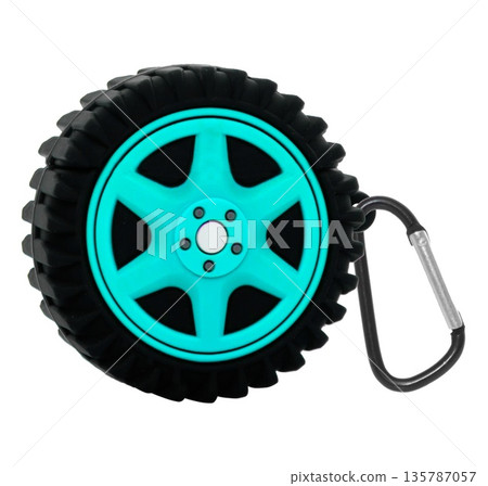 keychain for keys in the form of a car wheel, on a white background in the insulation keychain for keys in the form of a car wheel, on a white background in the insulation 135787057