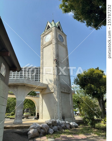The stone clock tower, a symbol of Akabane Park in Kita Ward, and the blue sky 135787232