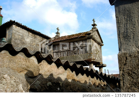 A building with a roof and a cross on top A building with a roof and a cross on top 135787245