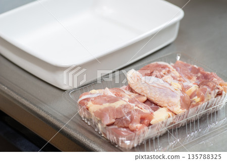 Preparing the Chicken Thighs 135788325