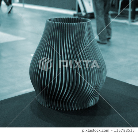 Art model printed on 3D printer from molten plastic. Object created on 3D printer. Form printed on 3D printer from blue plastic. Concept 3D printing technology. Additive progressive FDM technologies 135788533