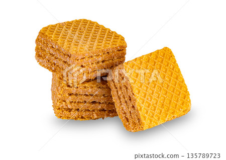 Pile of wafer filled with salted caramel flavered cream isolated on white background. 135789723