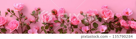 Pink rose blossoms and petals falling on soft background. Pink rose blossoms and delicate petals gently floating, creating a beautiful floral pattern Pink rose blossoms and petals falling on soft background. Pink rose blossoms and delicate petals gently floating, creating a beautiful floral pattern 135790284