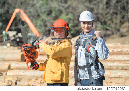 Male worker doing a fist pump 135790981