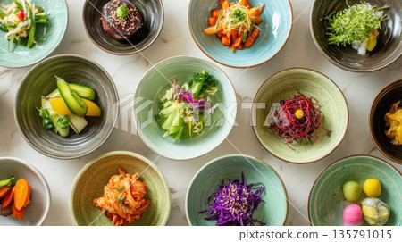 Colorful healthy appetizers in small bowls on marble Colorful healthy appetizers in small bowls on marble 135791015