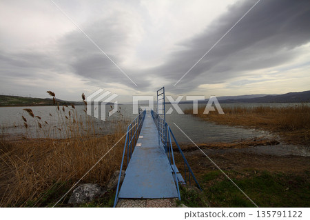 a pier on the lake a pier on the lake 135791122