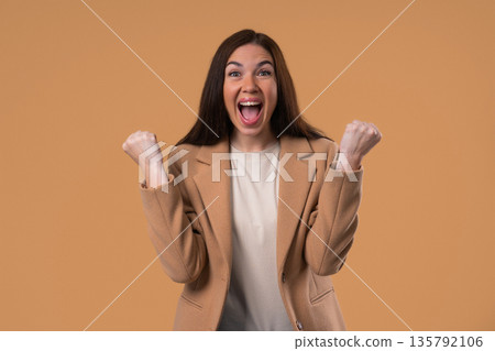 Happy Businesswoman Victory Gesture Yes, Clenched Fist, Joy Triumph Expression 135792106